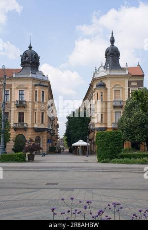 Debrecen, Hungary - Jun 18, 2023: A walking in the center of Debrecen city in northeastern Hungary in a sunny spring day. Selective focus. Stock Photo