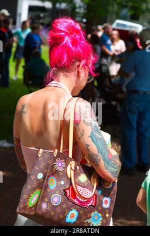 Father's Day Auto Show - Hyannis, Massachusetts, Cape Cod - USA, A girl with red hair and tattoos Stock Photo
