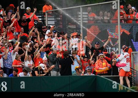 Mr. Splash sprays fans in the Bird Bath Splash Zone during the seventh  inning of a baseball game between the Baltimore Orioles and the Texas  Rangers, Friday, May 26, 2023, in Baltimore.