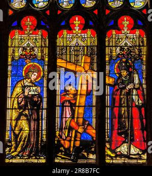 Saint Helena Simon of Cyrene Carrying Cross Bishop Queen Stained Glass St John the Baptist Cathedral Basilica Lyon France. Cathedral begun in 1180 and Stock Photo