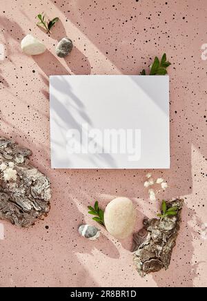 Sustainable, zero waste, recycling mock up among natural tree bark, green leaves, pebbles under shadows. Copy space. Stock Photo