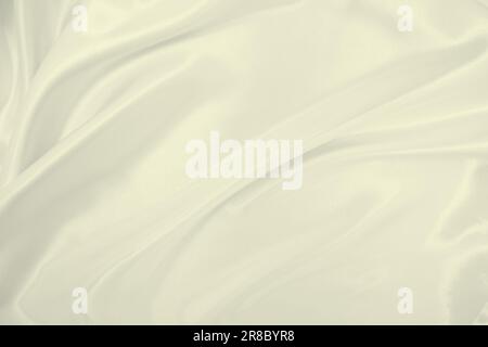 Smooth elegant golden silk or satin luxury cloth texture can use as wedding background. Luxurious background design. In Sepia toned. Retro style Stock Photo