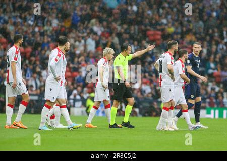 Glasgow, UK. 20th June, 2023. In the European Championship 2024, qualifying round, Callum McGregor scored Scotland's first goal after 6 minutes. Shortly after that the referee suspended play for 20 minutes because of poor pitch conditions after very heavy rain. Credit: Findlay/Alamy Live News Stock Photo