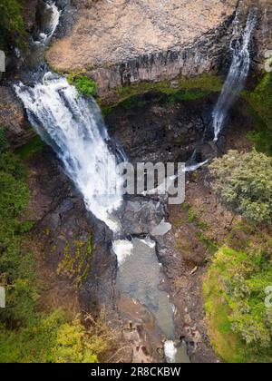 The Bousra waterfall with long exposure in the daylight in Cambodia Stock Photo