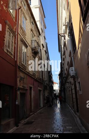 The city of Zadar and historical monuments with churches and a cathedral that are still in use today. The photos also show the coastal part of city. Stock Photo