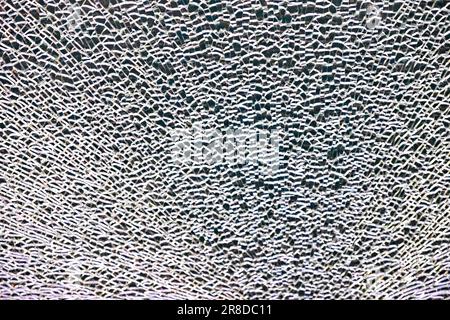 shattered smashed tempered glass window vandalism and insurance Stock Photo