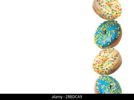 Many different tasty donuts on white background Stock Photo