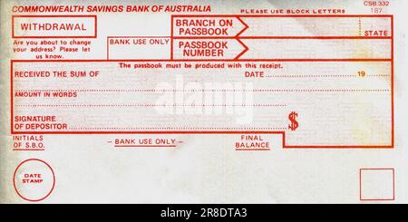 In the days of manual paper based banking when there were few credit cards and cash ruled, depositing and withdrawing money from a bank meant going to a branch and filling out a bank slip or in this case, a withdrawal slip. This document was for account holders at the Commonwealth Savings Bank of Australia, these days referred to a Commbank or CBA. Stock Photo