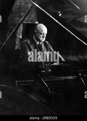Helsinki, Finland:  March 3, 1938 Finnish composer Jean Sibelius at the piano in his home. Stock Photo
