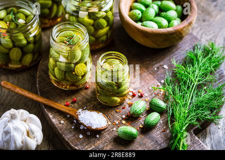 Homemade food: Pickled cucamelons (pickled cucumbers, pickled gherkins), grown in a organic kitchen Stock Photo