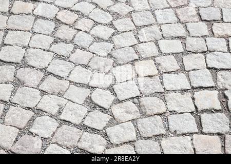 Cobblestone pavement high angle view full frame image. Stock Photo