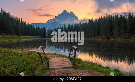Sunrise at Lake Antorno (Lago d'Antorno), a small mountain lake in the Italian Dolomites. It is located in the north of the Belluno province near the Stock Photo