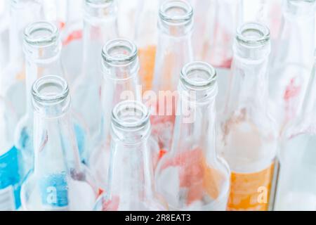 Empty glass bottles for recycling. Stock Photo