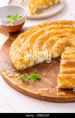 Traditional feta cheese phyllo pastry pie, borek or burek Stock Photo