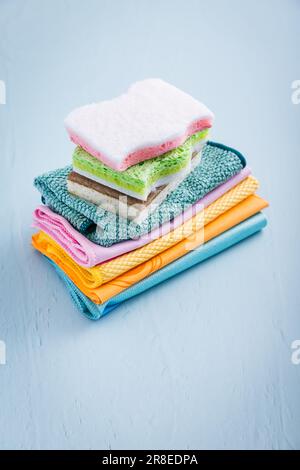 Assortment of different sponges and cleaning rags, with fiber cloth and duster microfiber cloth Stock Photo