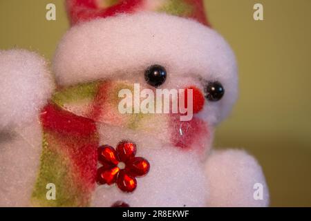 close-up of a beautiful white snowman from wool Stock Photo