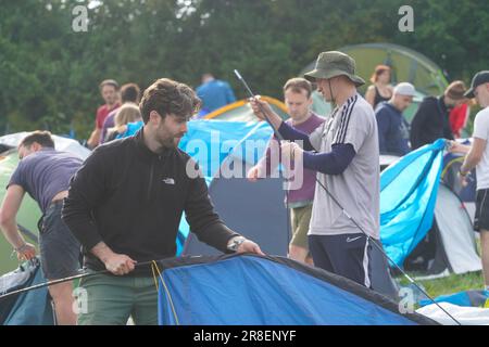 First arrivals pitching their tent at the 2023 Glastonbury festival. Wednesday, 21 June, 2023. Photo: Richard Gray/Alamy Live News Stock Photo