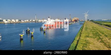 Panoramic picture from port Rotterdam with transport ships during daytime Stock Photo