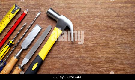 Carpentry tools on wood background with copy space Stock Photo