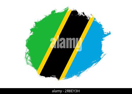 Rounded stain stroke brush textured national flag of Tanzania on white background Stock Photo