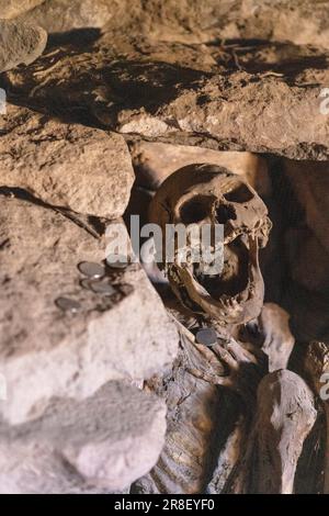 Cementerio de Chullpas / Cueva de las Momias: Cave with mummies near Coqueza, a village at the edge of the famous salt flats Salar de Uyuni in Bolivia Stock Photo