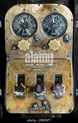 Vintage engine commands dashboard on the navigation bridge on the USS Midway, San Diego, California Stock Photo