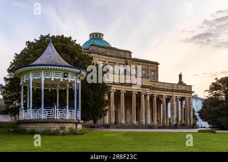 Pittville Pump Room and old spa mineral water buildings in Pittville Park, Cheltenham, Gloucestershire, England Stock Photo