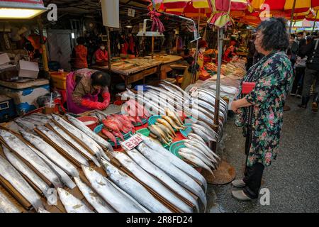 Busan, South Korea - May 28, 2023: Fish vendors in Jagalchi Market in Busan, South Korea. Stock Photo