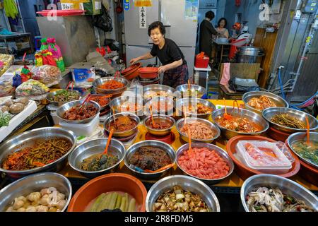 Busan, South Korea - May 28, 2023: Pickle sellers in the Jagalchi Market in Busan, South Korea. Stock Photo