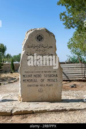 A memorial stone dedicated to the Biblical figure Moses, who is believed to have died and been buried at Mt Nebo in Jordan. Stock Photo