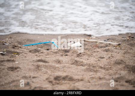 Trash on the beach Stock Photo