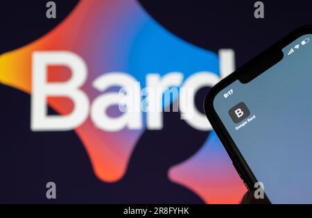 In this photo illustration, a Google Bard AI chatbot app icon is displayed on a smartphone with a Google BARD AI chat bot logo in the background Stock Photo