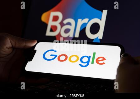 In this photo illustration, a Google logo is displayed on a smartphone with a Google BARD AI chat bot logo in the background Stock Photo