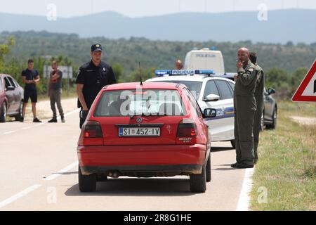 Pakovo Selo, Croatia. 21st June, 2023. In the canyon of the Cikola River in the area of Pakovo Selo in the Sibenik-Knin County, a helicopter of the Hungarian Armed Forces, which was in Croatia for training, crashed. The police blocked the road towards the helicopter crash site, An Mi-171 Sh helicopter and a Pilatus airplane of the Croatian Air Force joined a search for a military helicopter that crashed, three passengers were found dead, in Pakovo Selo, Croatia, on June 21, 2023. Photo: Dusko Jaramaz/PIXSELL Credit: Pixsell/Alamy Live News Stock Photo