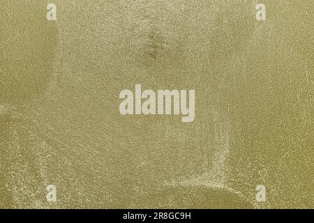 Texture of golden decorative plaster or concrete. Abstract gold grunge background for design. Stock Photo