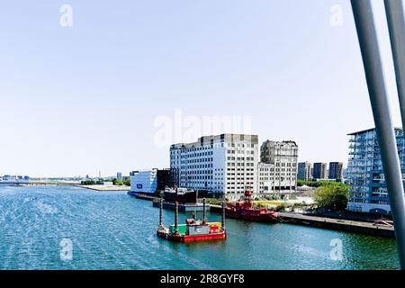 SS Robin and Trinity lightship docked next to the Millennium Mills in Silvertown opposite the Excel centre in east London Stock Photo