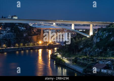 View at night of several bridges connection the 2 river banks of the River Douro in Porto, Portugal Stock Photo