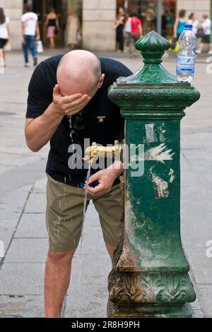 Cool In A Fountain Near Duomo Square. Milan. Italy Stock Photo