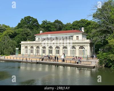 The classic Boat House (built 1905) in Prospect Park viewed from the Lullwater Bridge. Stock Photo