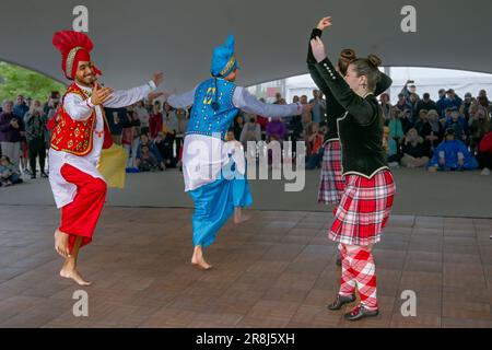 Dance Fusion collaboration with Highland and Punjabi Bhangra dancers, Scotfest,Town Centre Park, Coquitlam, British Columbia, Canada, Stock Photo