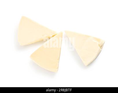 Triangles of tasty processed cheese on white background Stock Photo