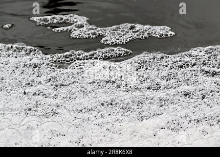 Air bubbles on a fast moving stream Stock Photo