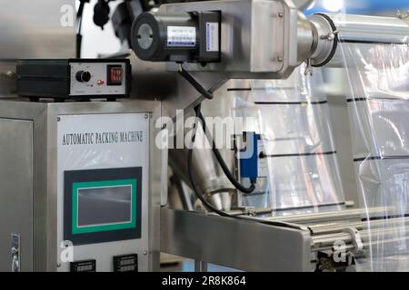 Control console of automatic food packing machine. Selective focus. Stock Photo