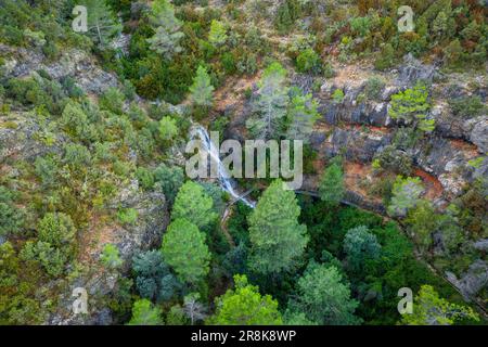 Waterfall of a ravine under the Penyagalera / Peñagalera in the Puertos of Beceite descending with a good flow after heavy rains. Beceite Teruel Spain Stock Photo