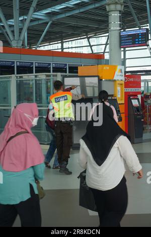 you can see the train security giving instructions to train passengers