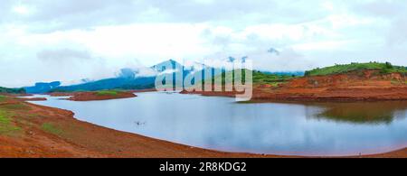 A beautiful panoramic scenery from the Banasura sagar dam in Western Ghats, Kerala, the second largest earthen dam in Asia Stock Photo