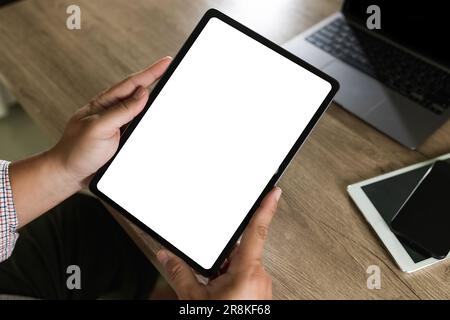 man hand holding digital tablet touch white screen device isolated screen ONLINE ADVERTISING communication empty space frame mockup, internet touchpad Stock Photo