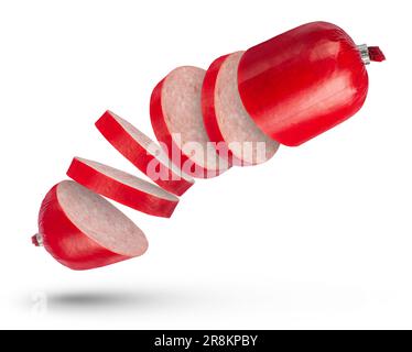 Packed salami sausage on a white isolated background. The sausage is torn into pieces. The concept of knife craftsmanship and fast cutting. To be Stock Photo