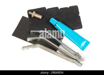Bicycle flat tire repair kit, isolated on white Stock Photo