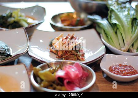 Korean pork ribs and beef marbled Korean BBQ style charcoal grill Stock Photo